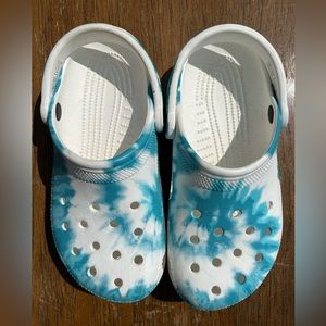 Women’s blue and white Crocs